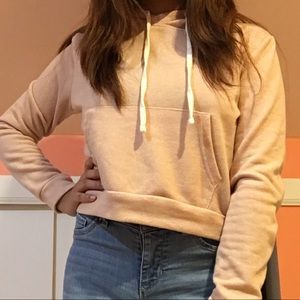 cropped light pink sweater